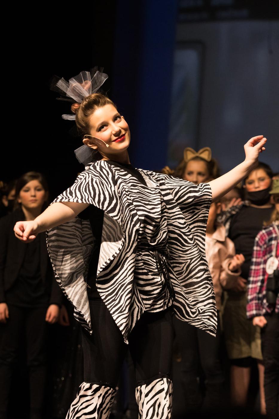 Ariella Sinclair as Marty in Madagascar in zebra costume